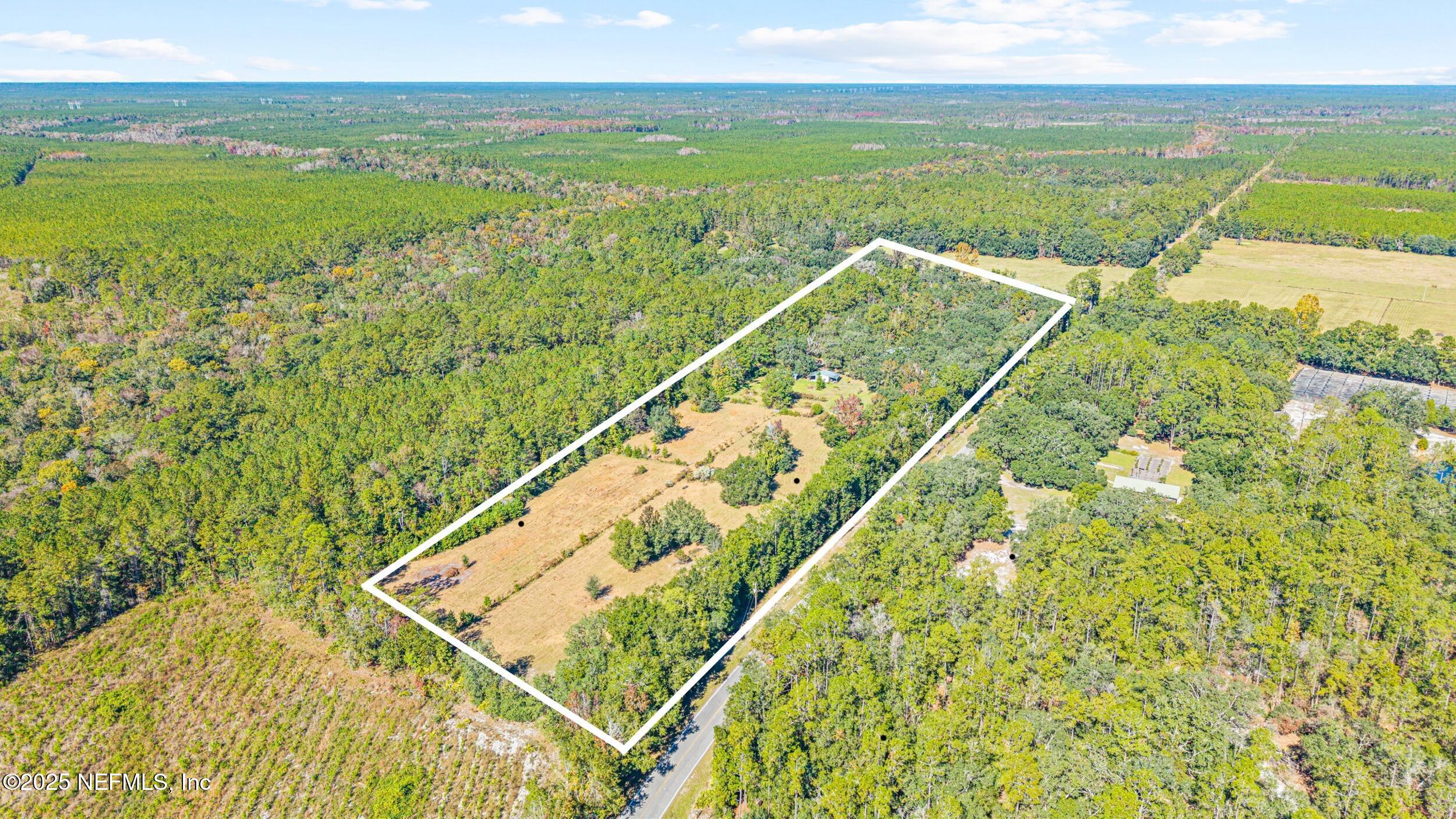 1463 Bardin Road Palatka, FL 32177 - Photo 3 of 61 a view of an ocean from a balcony