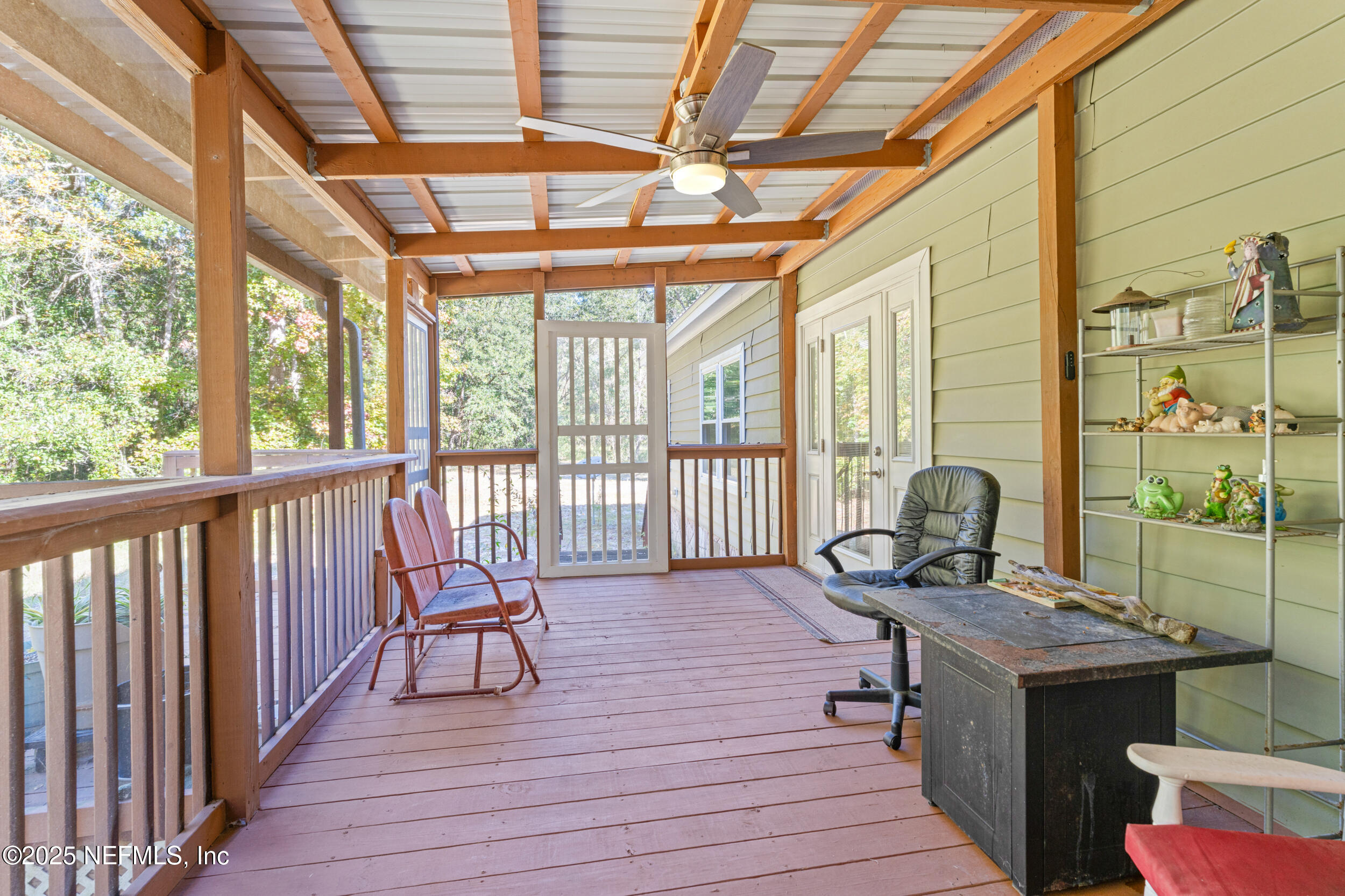 1463 Bardin Road Palatka, FL 32177 - Photo 39 of 61 a balcony with furniture and wooden floor