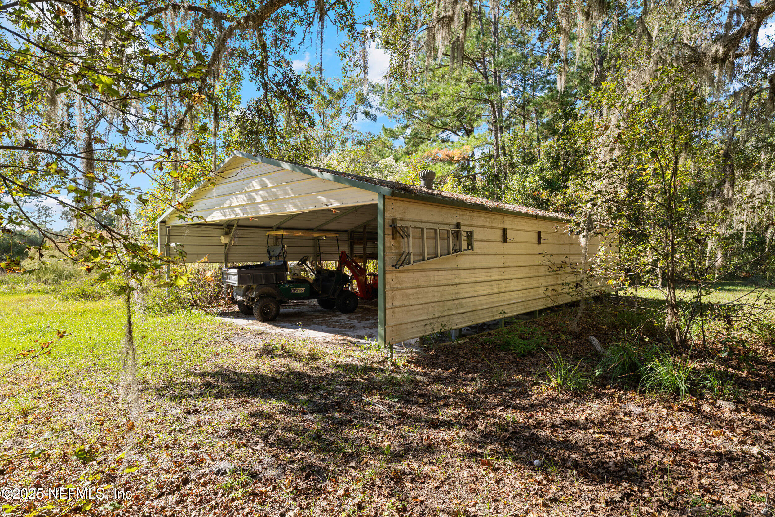 1463 Bardin Road Palatka, FL 32177 - Photo 45 of 61 a view of a house with a yard