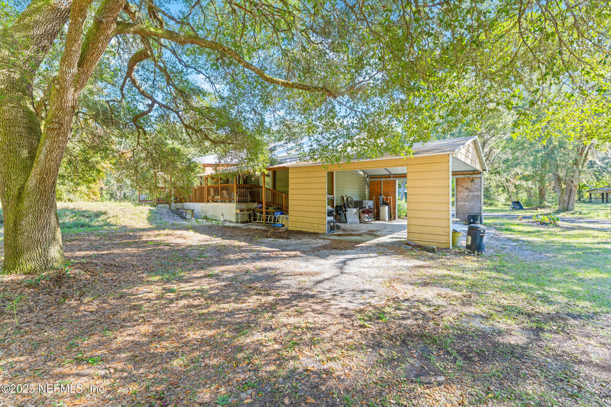 1463 Bardin Road Palatka, FL 32177 - Photo 47 of 61 a view of a yard with tree