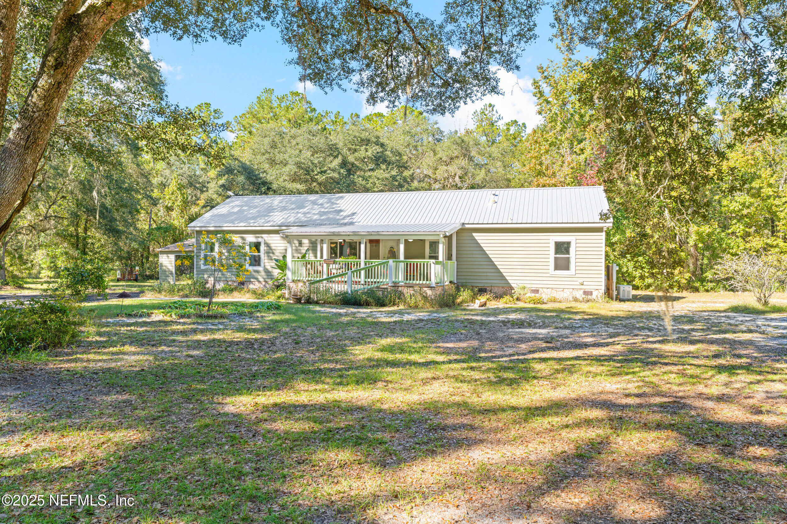 1463 Bardin Road Palatka, FL 32177 - Photo 10 of 61 a view of a house with a swimming pool