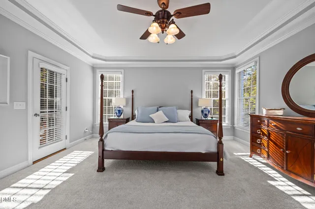 a large bathroom with a large mirror vanity and shower