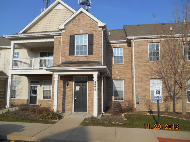 4425 Timber Ridge Court, Unit 117 Joliet, IL 60431 - Photo 1 of 10 front view of a house