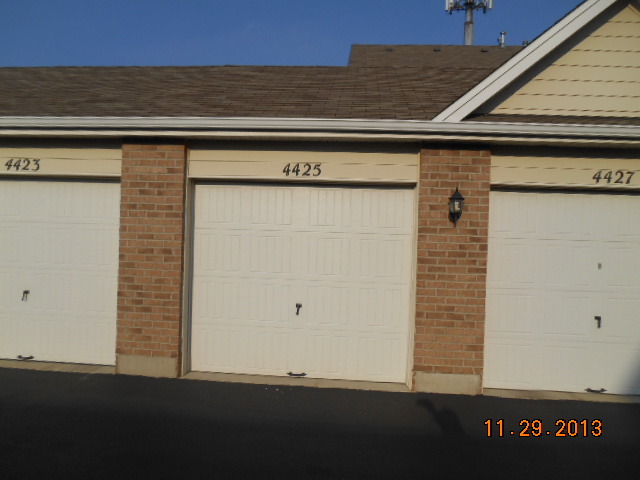 4425 Timber Ridge Court, Unit 117 Joliet, IL 60431 - Photo 4 of 10 a view of wooden door