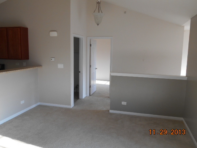 4425 Timber Ridge Court, Unit 117 Joliet, IL 60431 - Photo 6 of 10 a view of an empty room