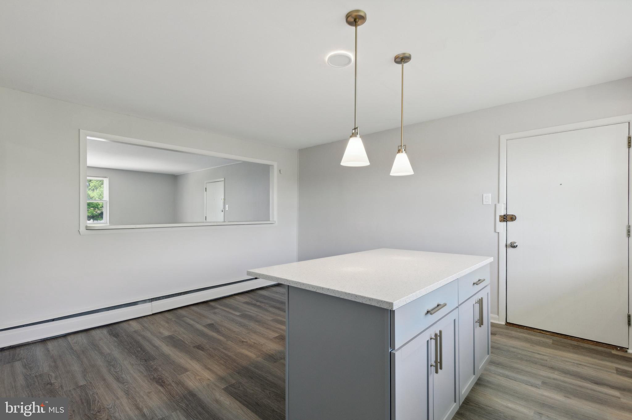 500 Manor House Lane, Unit B3 Willow Grove, PA 19090 - Photo 2 of 10 a kitchen that has a lot of cabinets in it