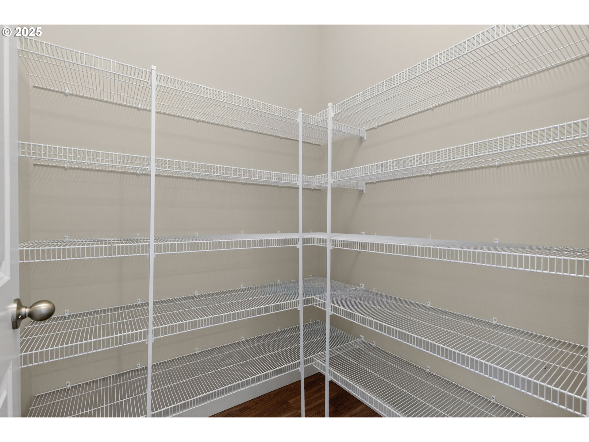 9863 Southwest Ridge Drive Beaverton, OR 97007 - Photo 11 of 48 a view of a room with shelves