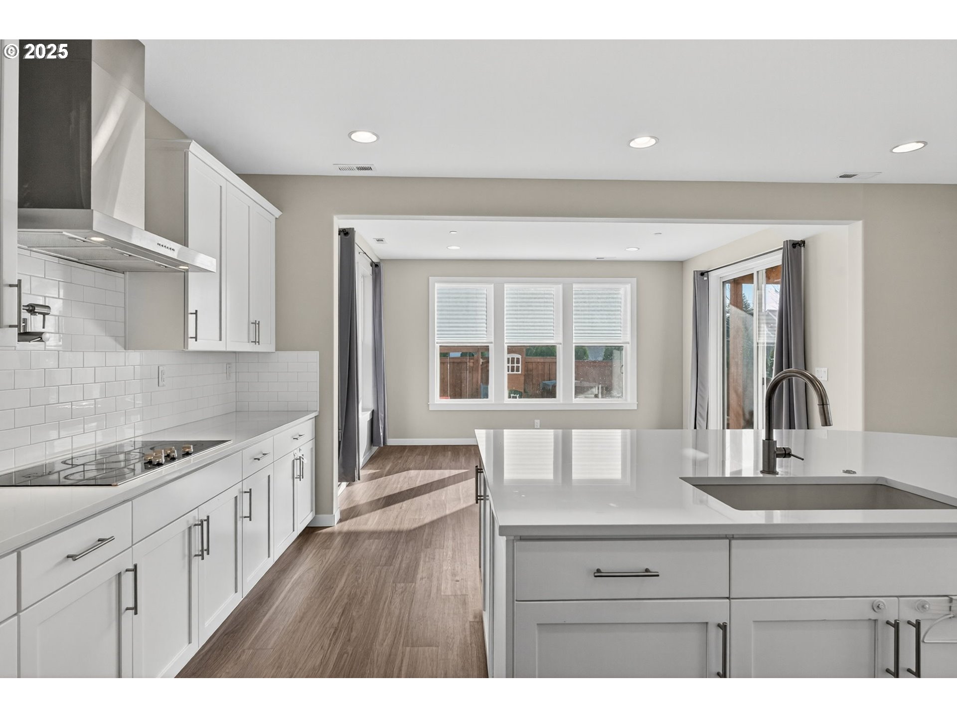 9863 Southwest Ridge Drive Beaverton, OR 97007 - Photo 14 of 48 a kitchen with a sink cabinets and window