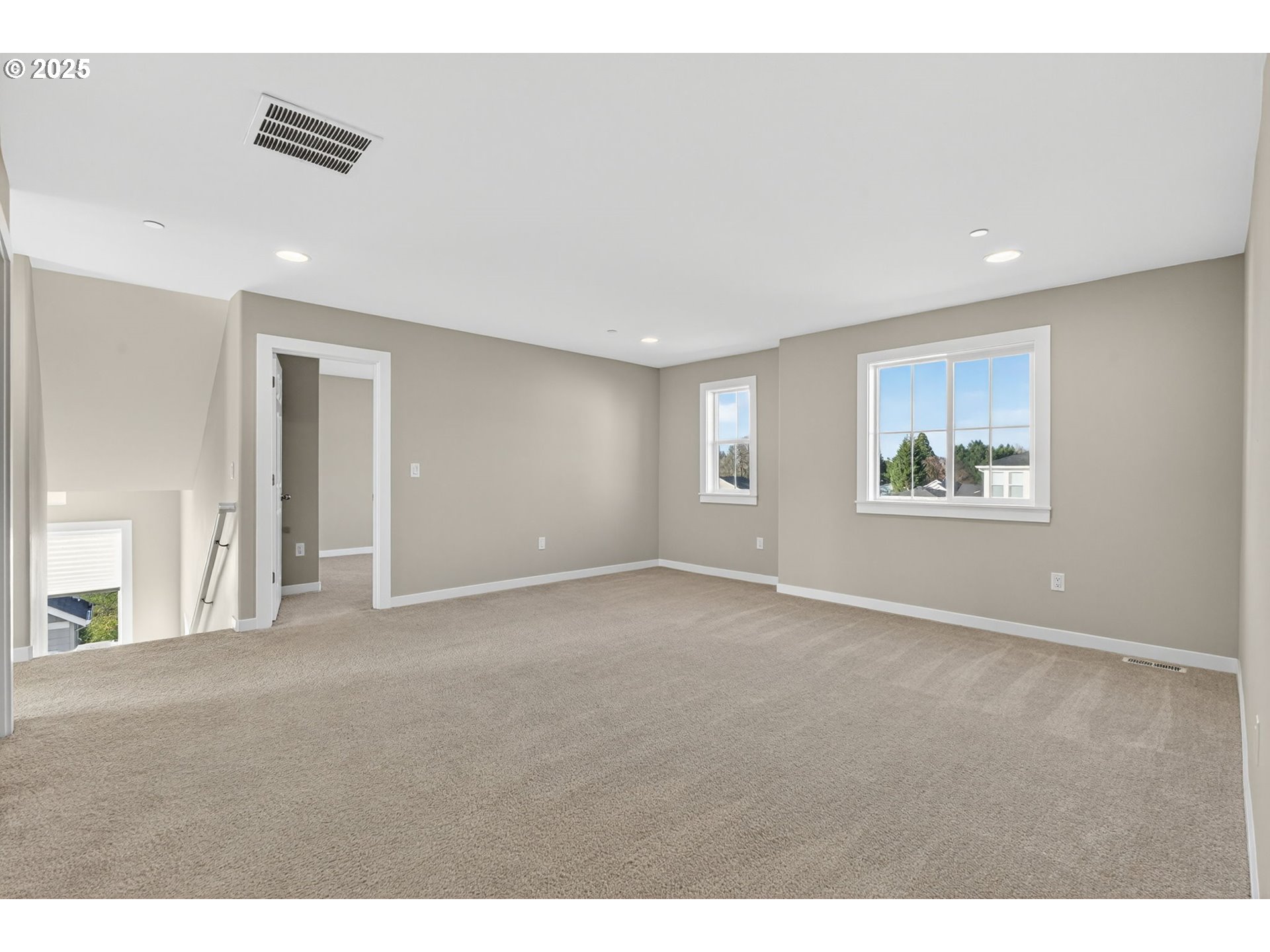9863 Southwest Ridge Drive Beaverton, OR 97007 - Photo 28 of 48 a view of an empty room with a window