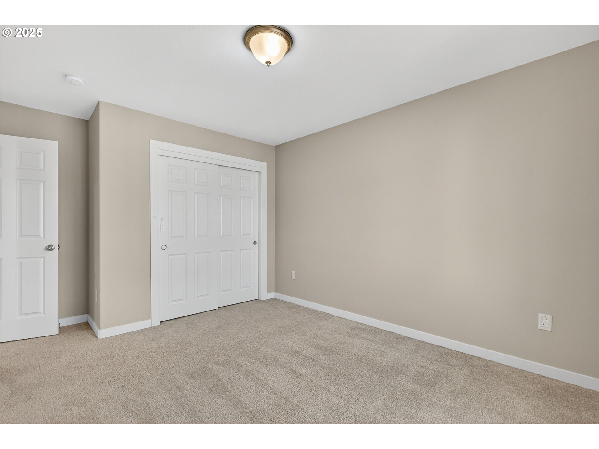 9863 Southwest Ridge Drive Beaverton, OR 97007 - Photo 30 of 48 a view of an empty room