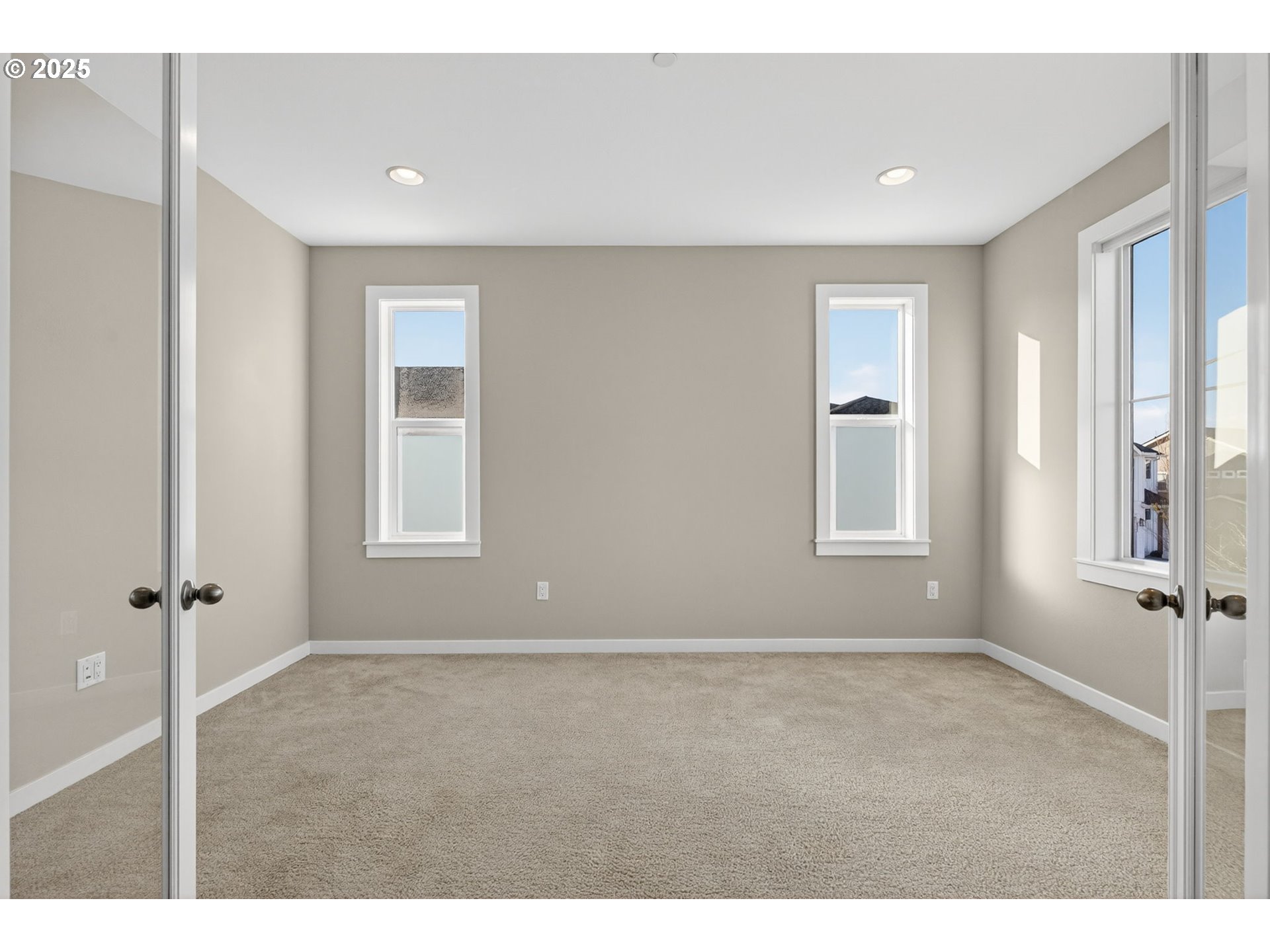 9863 Southwest Ridge Drive Beaverton, OR 97007 - Photo 3 of 48 a view of an empty room with a window