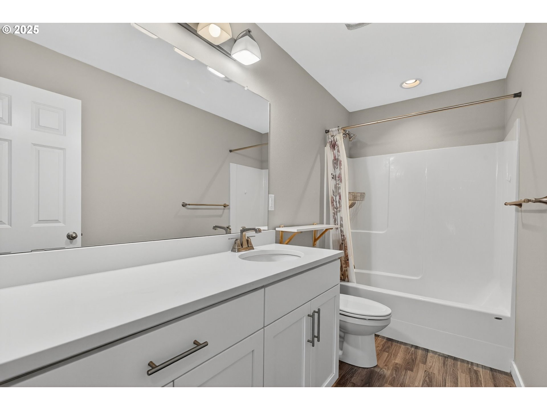 9863 Southwest Ridge Drive Beaverton, OR 97007 - Photo 34 of 48 a bathroom with a sink a toilet and shower