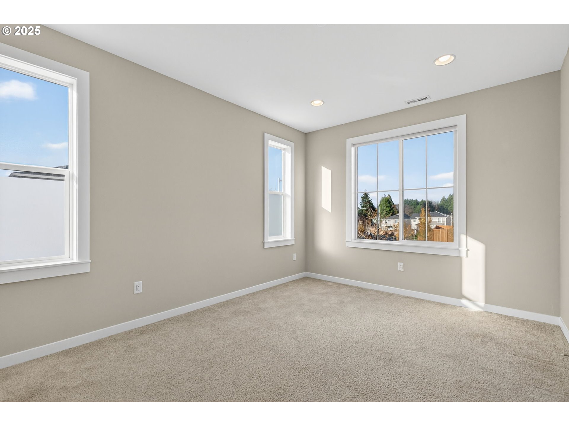 9863 Southwest Ridge Drive Beaverton, OR 97007 - Photo 4 of 48 a view of an empty room with a window