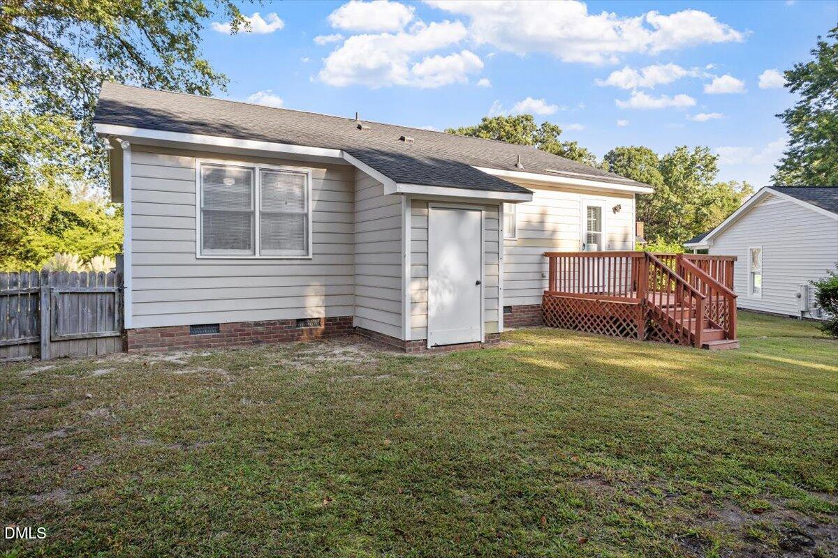 4208 Bluewing Road Raleigh, NC 27616 - Photo 4 of 21 a view of a backyard with a garden