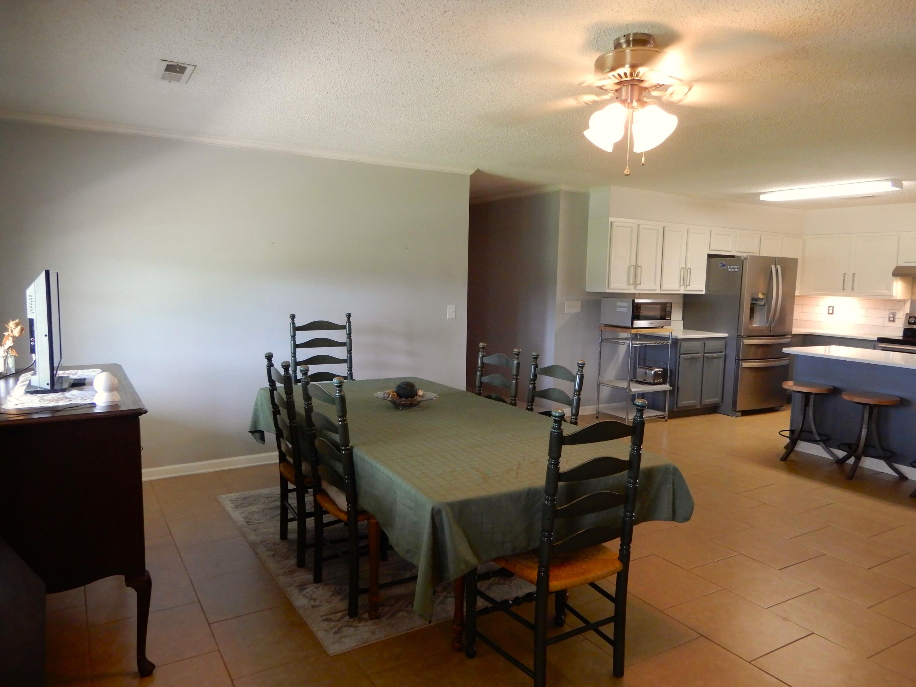 1875 State Route 384 Fancy Farm, KY 42039 - Photo 15 of 72 Kitchen and Living room is one large room.