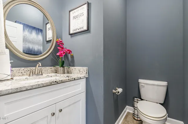 a kitchen with sink and cabinets