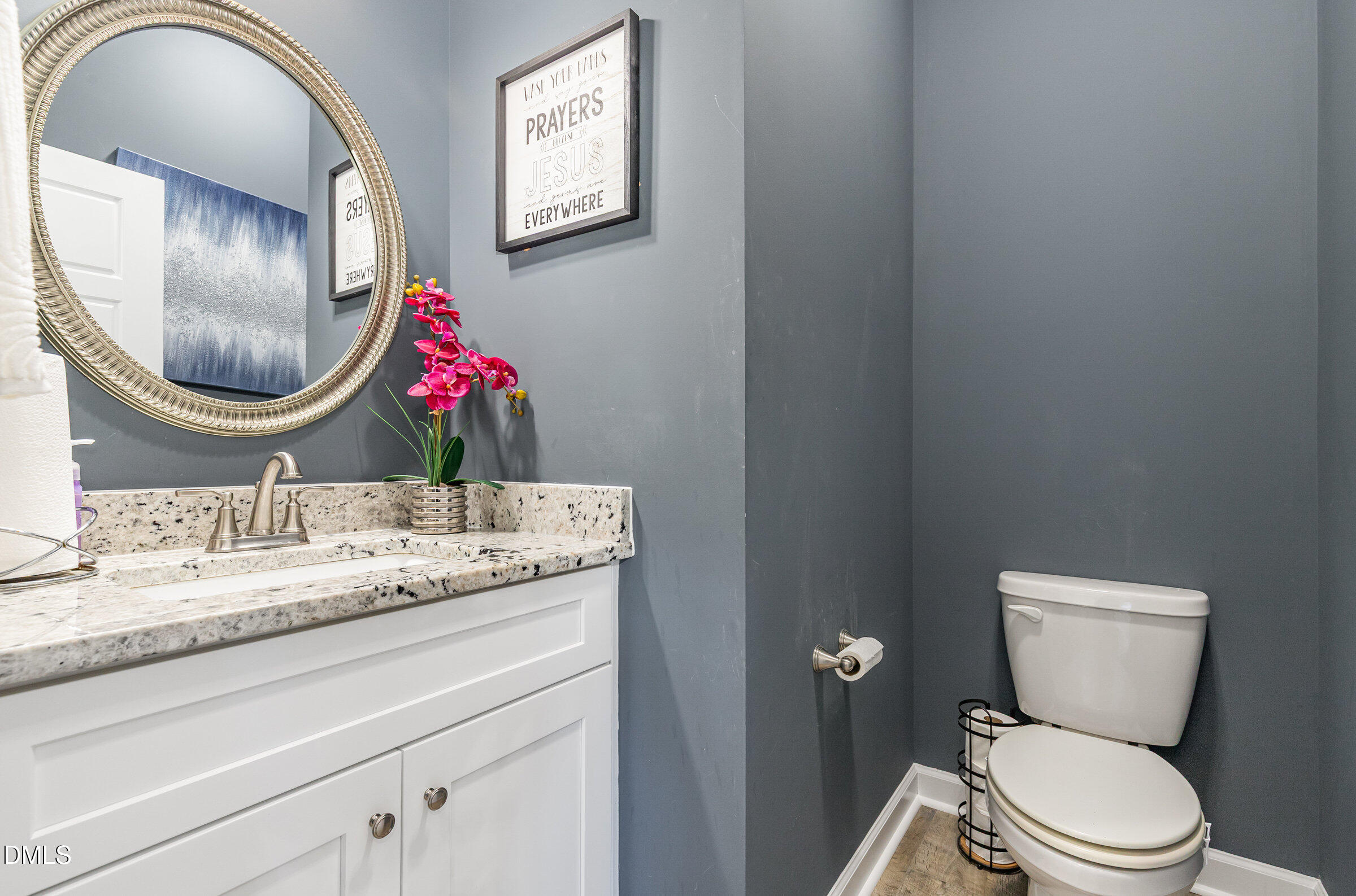 8662 Buckhorn Plantation Road Sims, NC 27880 - Photo 15 of 40 a bathroom with a toilet and a sink