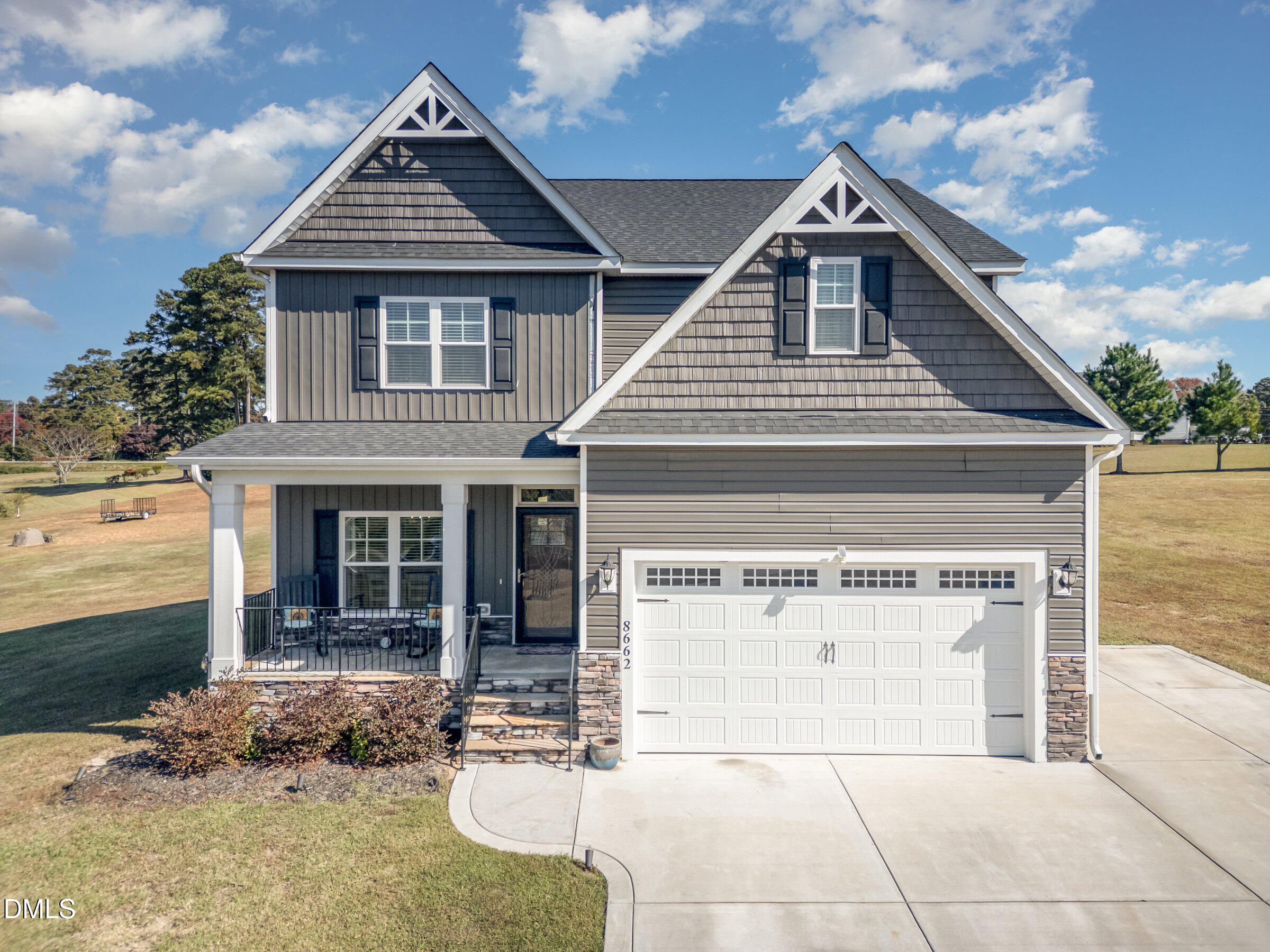 8662 Buckhorn Plantation Road Sims, NC 27880 - Photo 37 of 40 a view of a house with large windows