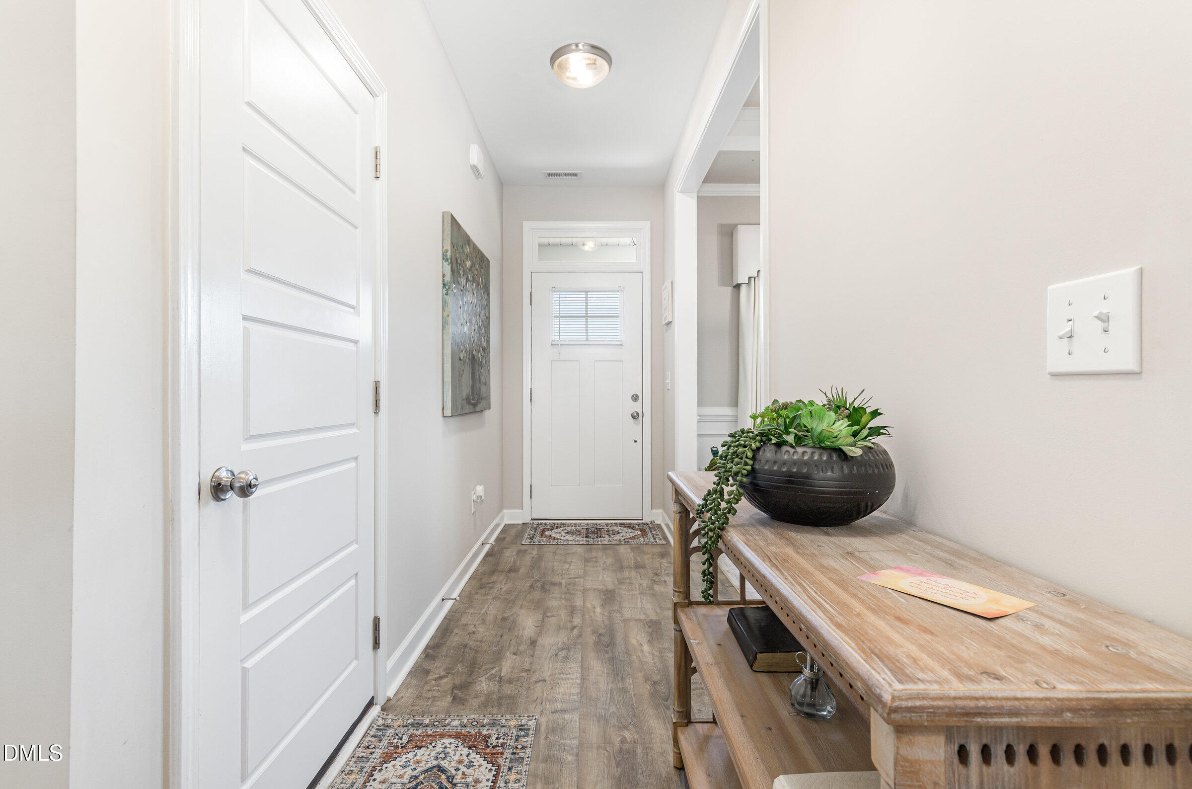 8662 Buckhorn Plantation Road Sims, NC 27880 - Photo 7 of 40 a room with furniture and a potted plant