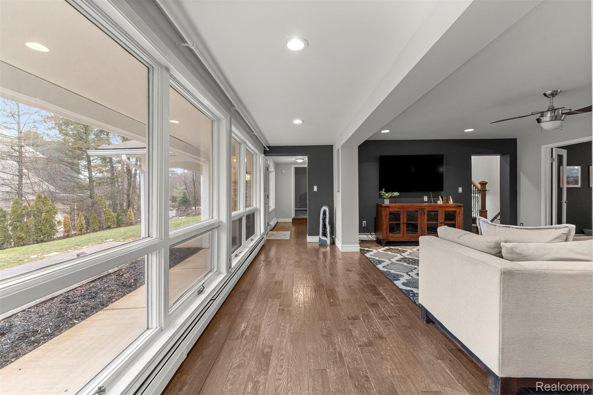 45401 West 9 Mile Road Novi, MI 48374 - Photo 3 of 67 Living area with a baseboard radiator, dark wood finished floors, and recessed lighting