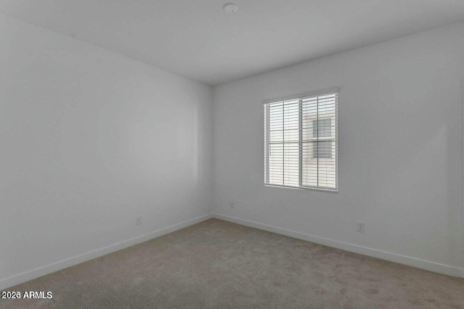 6434 North 17th Street Phoenix, AZ 85016 - Photo 23 of 38 an empty room with a window