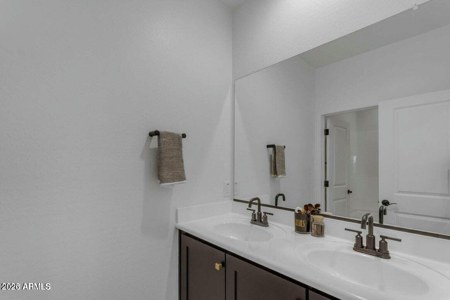 6434 North 17th Street Phoenix, AZ 85016 - Photo 24 of 38 a bathroom with a sink and a mirror