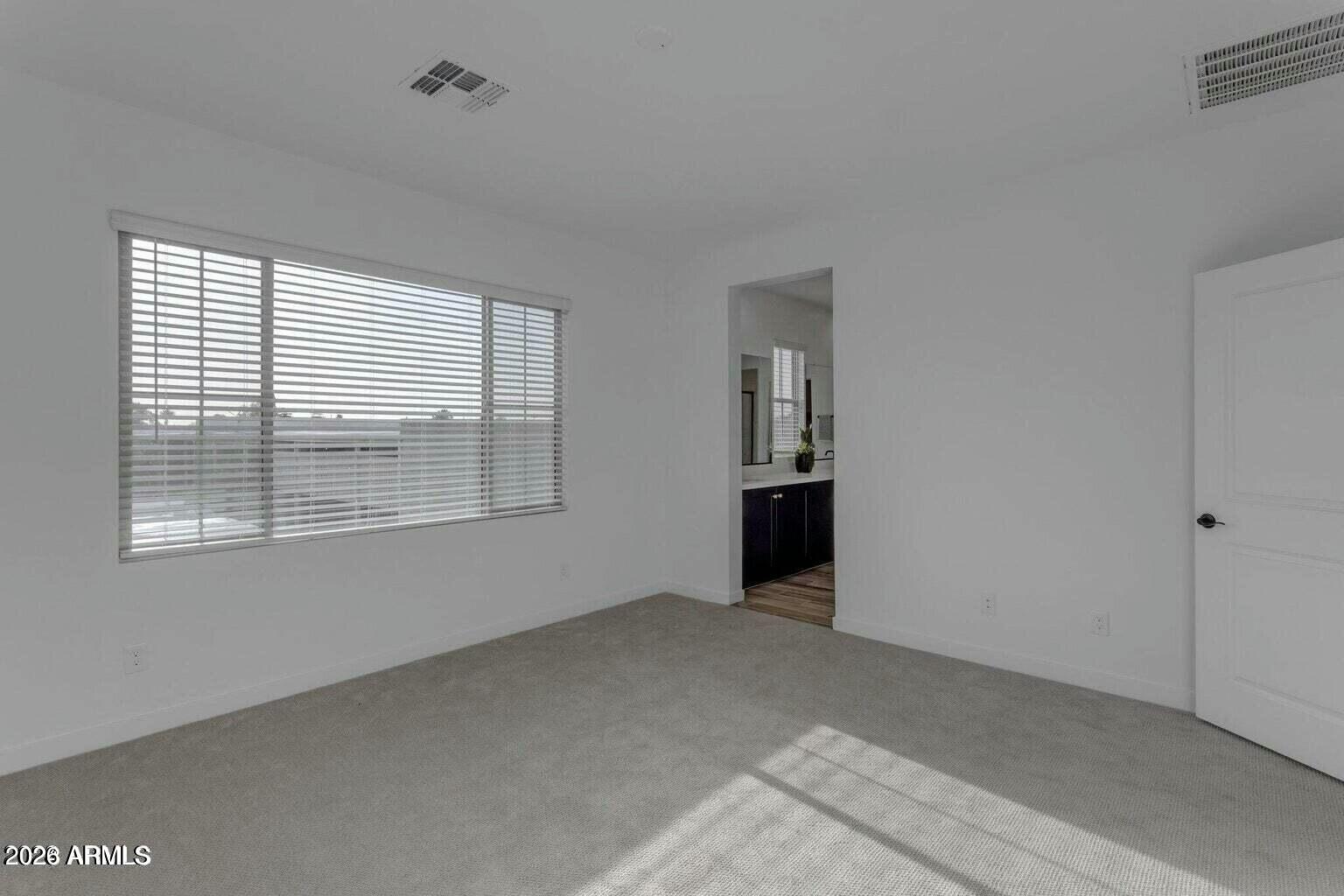 6434 North 17th Street Phoenix, AZ 85016 - Photo 30 of 38 a view of an empty room with a window