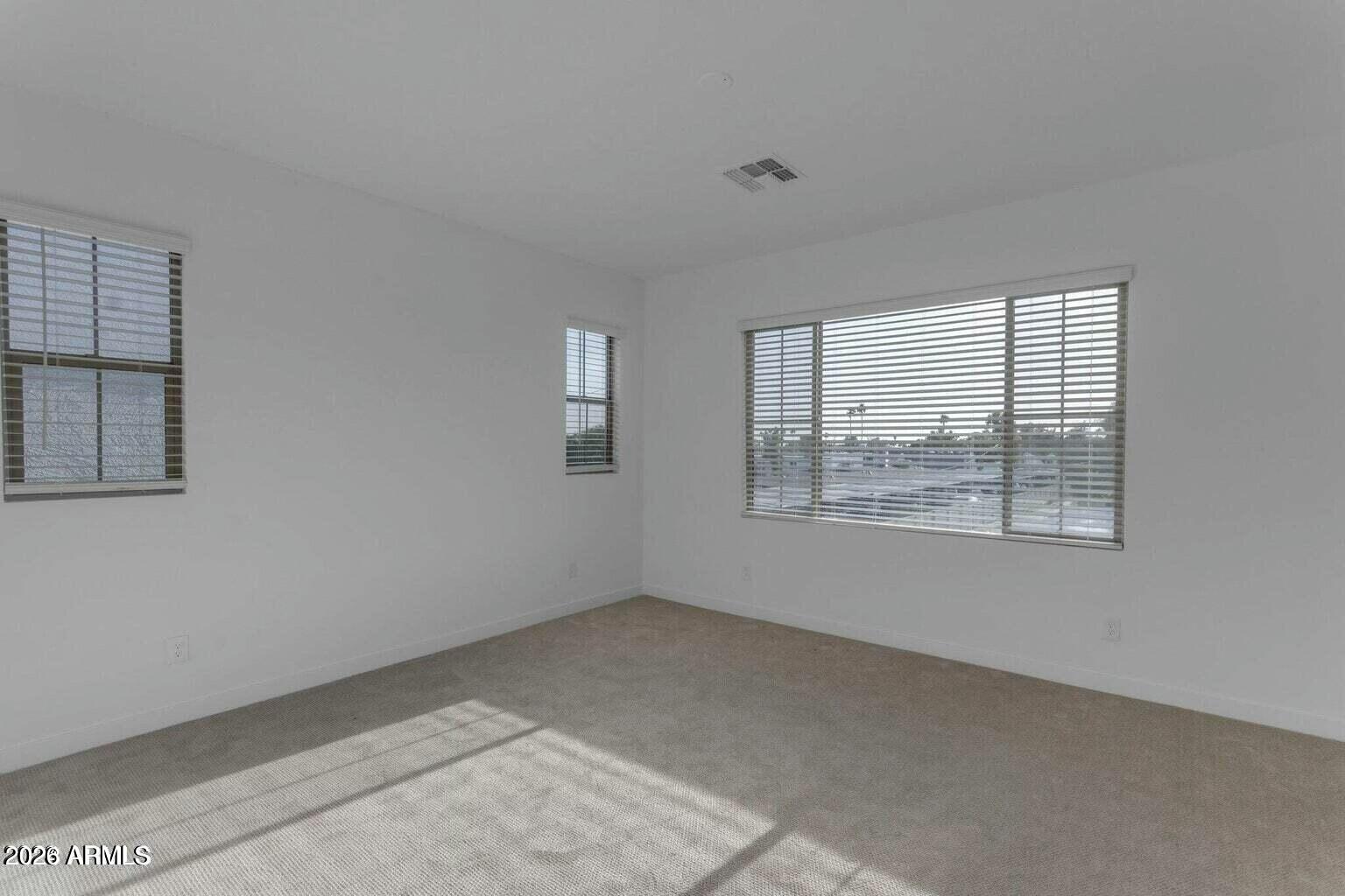 6434 North 17th Street Phoenix, AZ 85016 - Photo 31 of 38 an empty room with windows