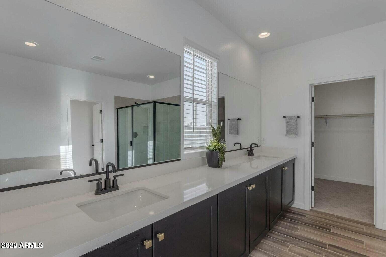 6434 North 17th Street Phoenix, AZ 85016 - Photo 33 of 38 a bathroom with a sink double vanity and a mirror