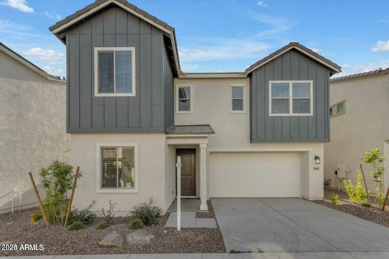 6434 North 17th Street Phoenix, AZ 85016 - Photo 6 of 38 a front view of a house with garden