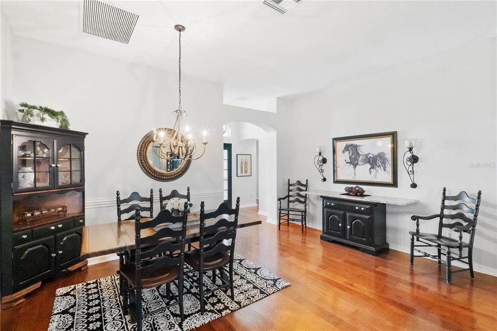 1456 Honea Path The Villages, FL 32162 - Photo 15 of 44 a view of a dining room with furniture