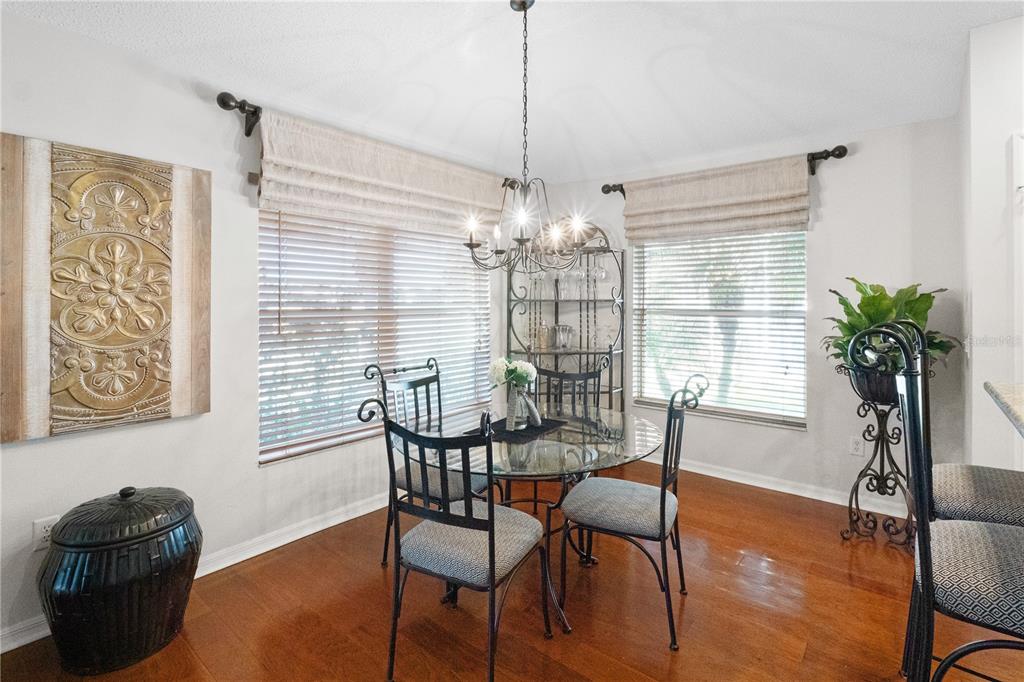 1456 Honea Path The Villages, FL 32162 - Photo 20 of 44 a dining room with furniture and window