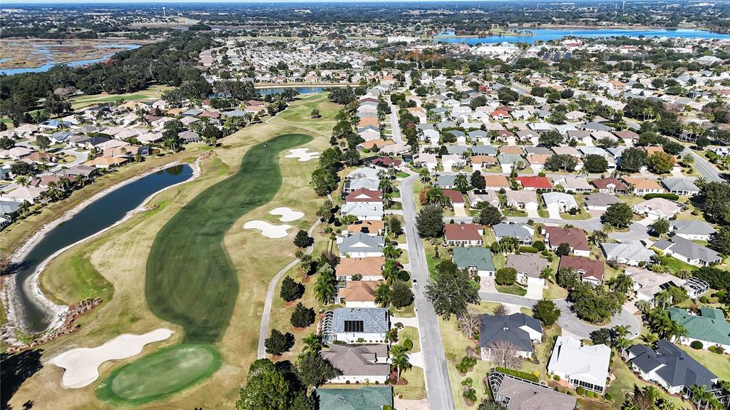 1456 Honea Path The Villages, FL 32162 - Photo 2 of 44 an aerial view of a swimming pool