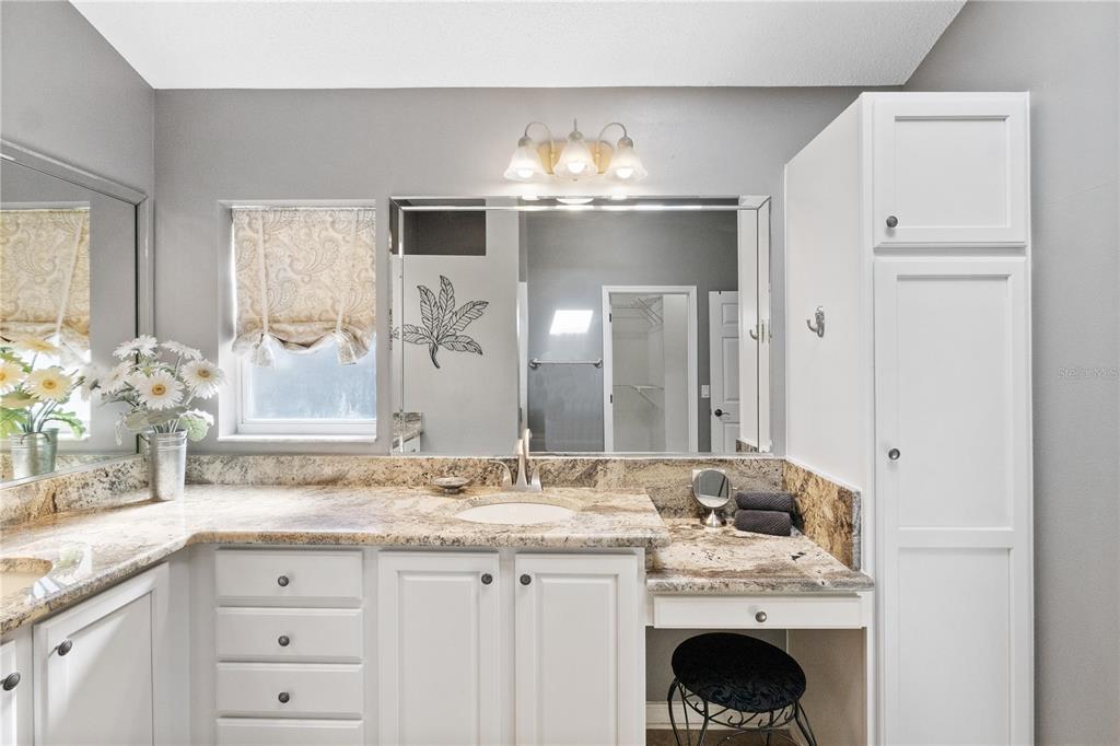 1456 Honea Path The Villages, FL 32162 - Photo 37 of 44 a bathroom with a sink double vanity and a mirror