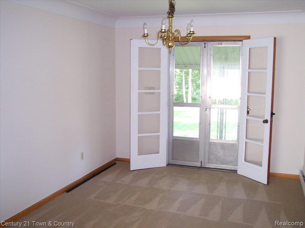6051 Middle Lake Road Clarkston, MI 48346 - Photo 6 of 24 Formal Dining Room Leads to Vera