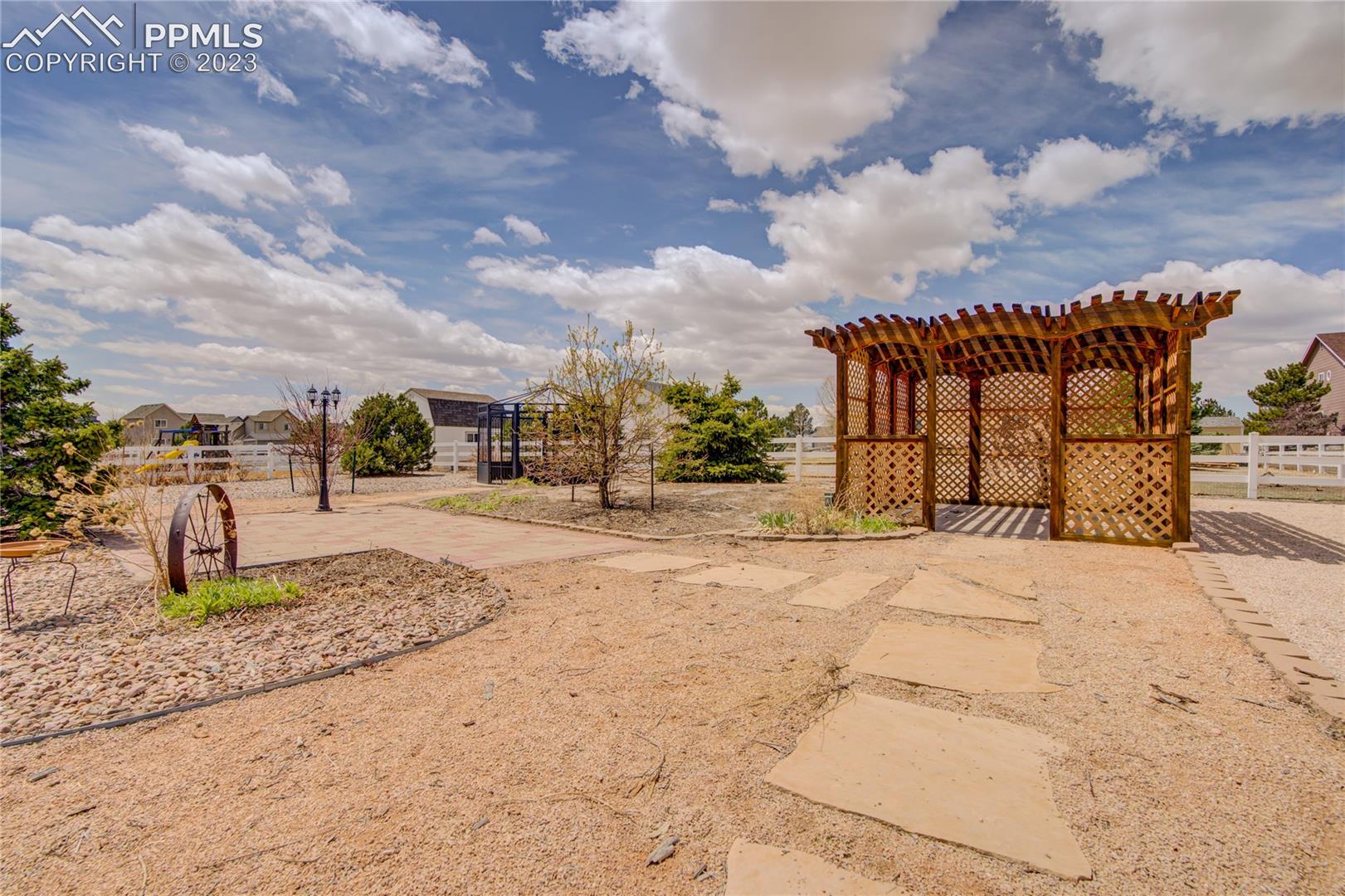 7730 Midnight Road Peyton, CO 80831 - Photo 40 of 50 Gazebo 1 on a concrete pad with GFI outlet
