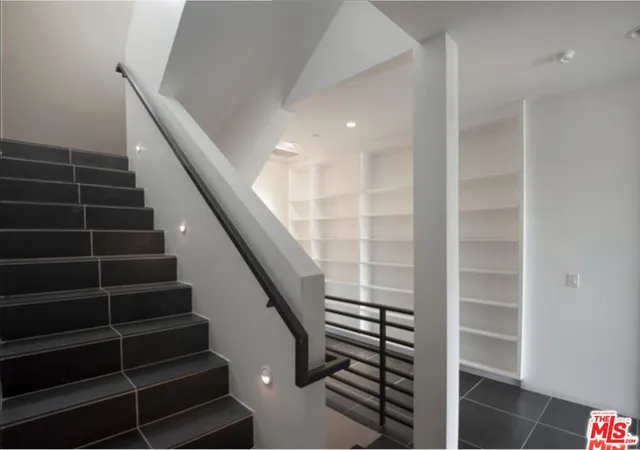 a view of a balcony with an ocean view