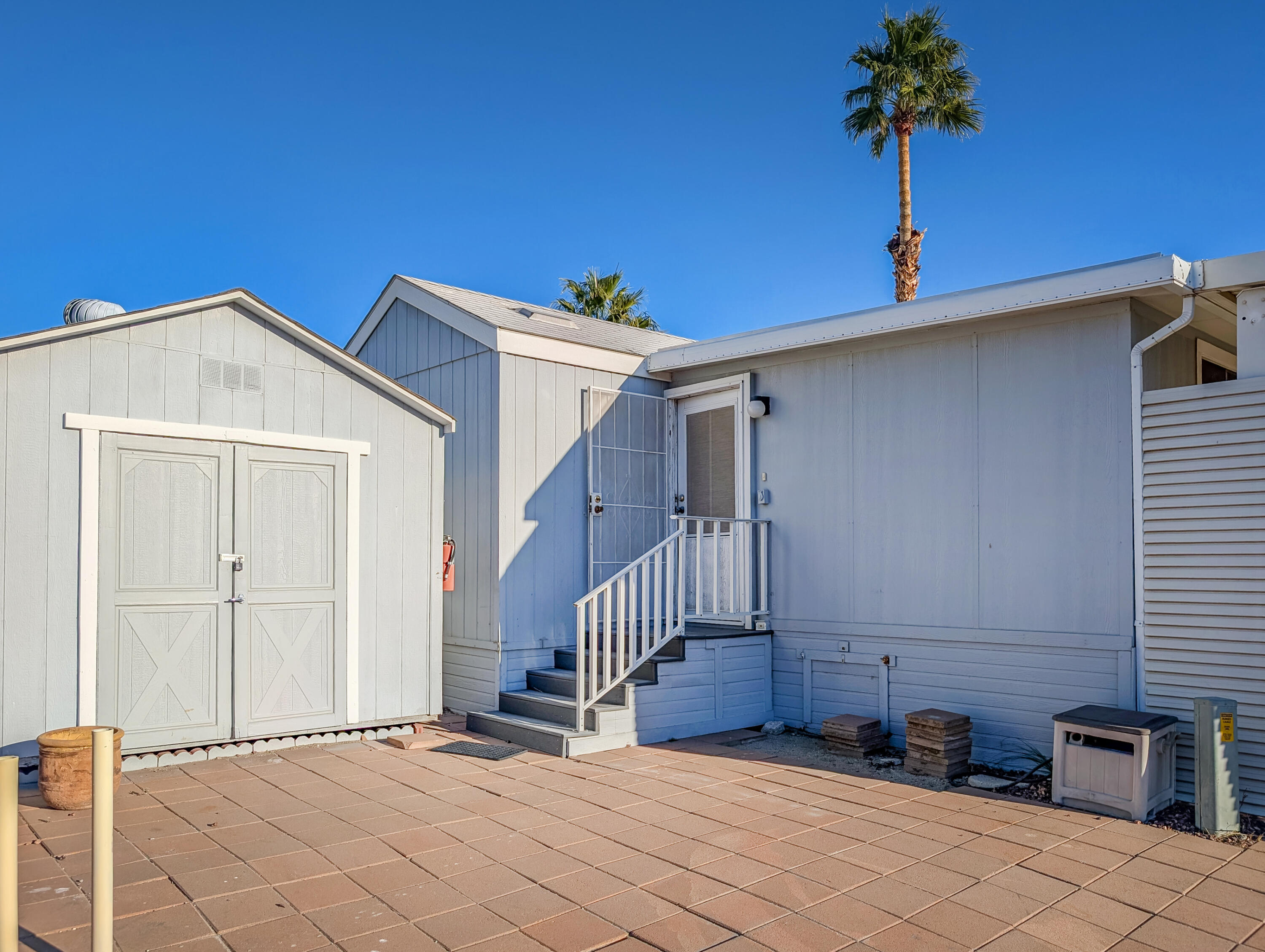 70200 Dillon Road, Unit 517 Desert Hot Springs, CA 92241 - Photo 6 of 32 a view of a house with a tub and potted plants