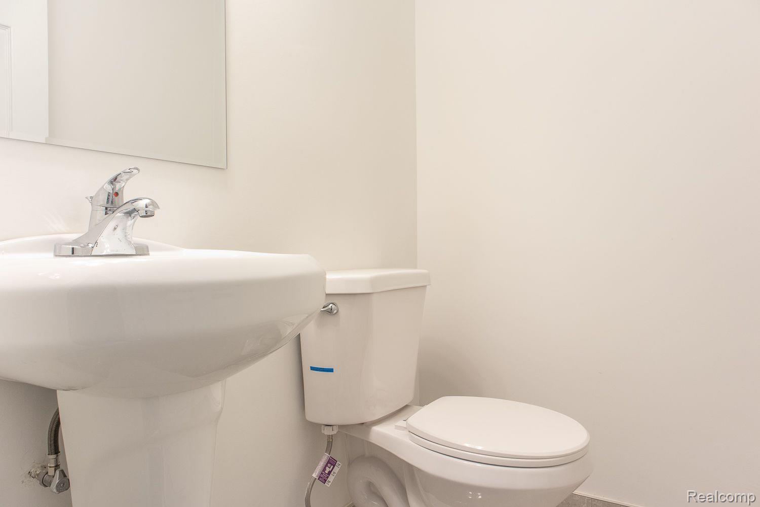 8724 Common Road Warren, MI 48093 - Photo 9 of 22 NEW POWDER ROOM.
