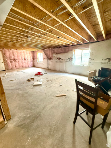 1823 South Longview Road Santaquin, UT 84655 - Photo 58 of 69 Unfinished basement featuring exposed wood joists, concrete flooring, two windows, and insulated walls