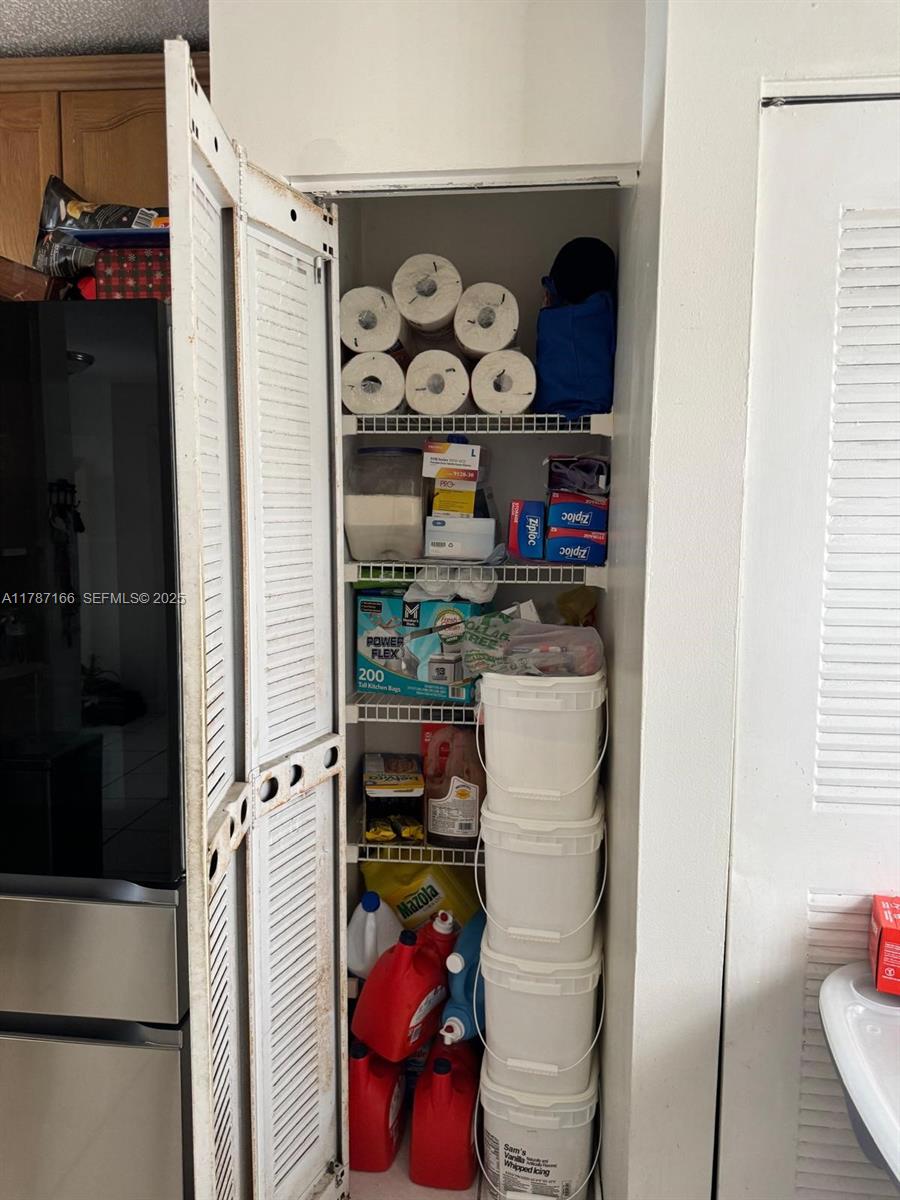 12355 Northwest 7th Lane Miami, FL 33182 - Photo 21 of 21 a view of water heater room