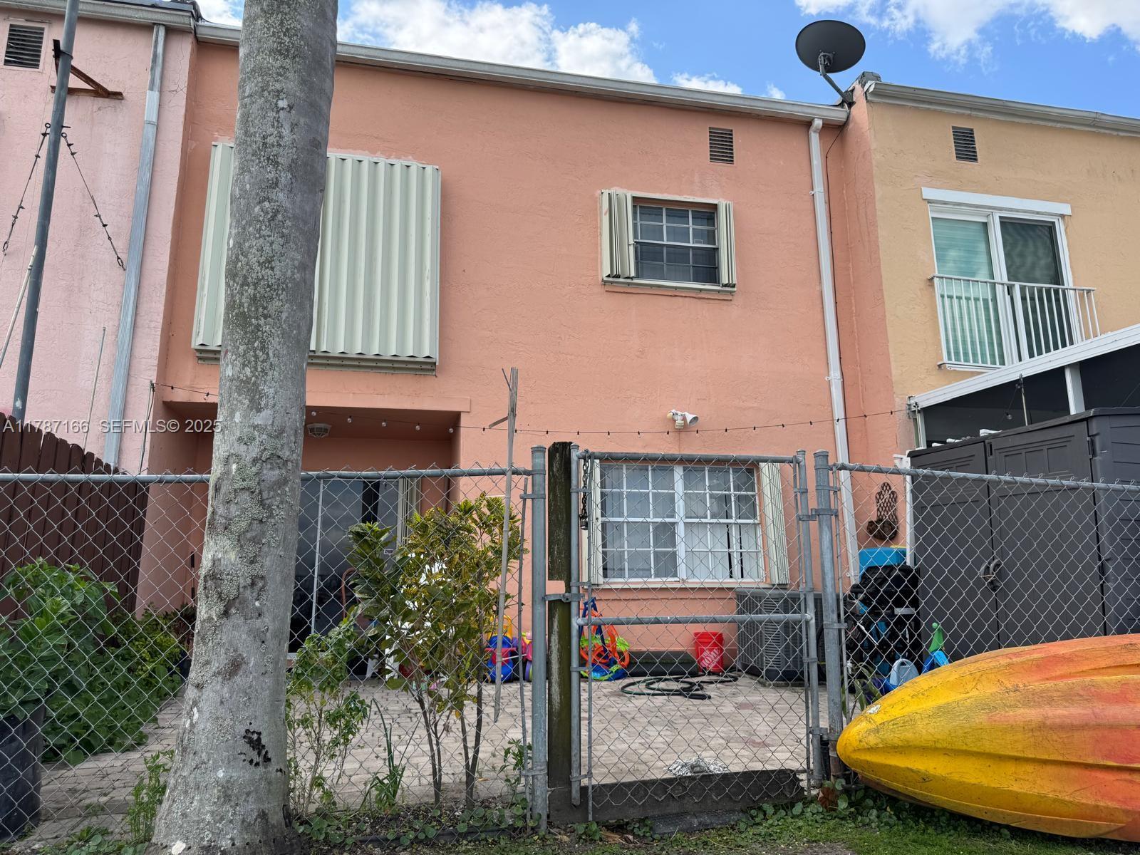 12355 Northwest 7th Lane Miami, FL 33182 - Photo 5 of 21 a view of a porch with a bench