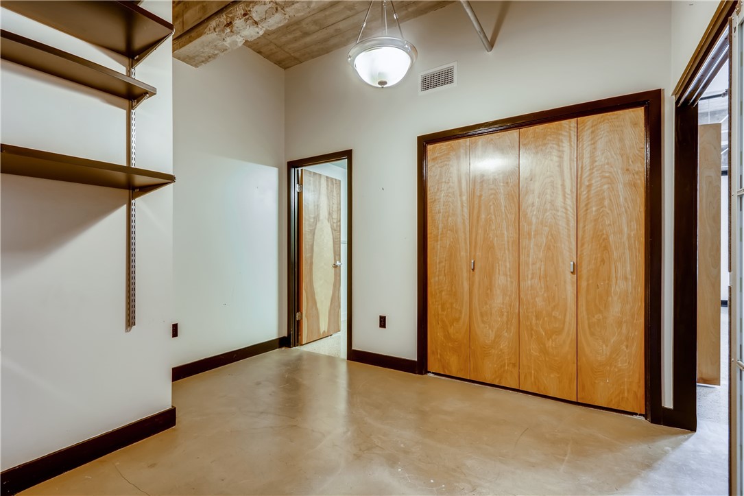 710 Colorado Street, Unit 4J Austin, TX 78701 - Photo 23 of 37 This bedroom also has an ensuite full bath!