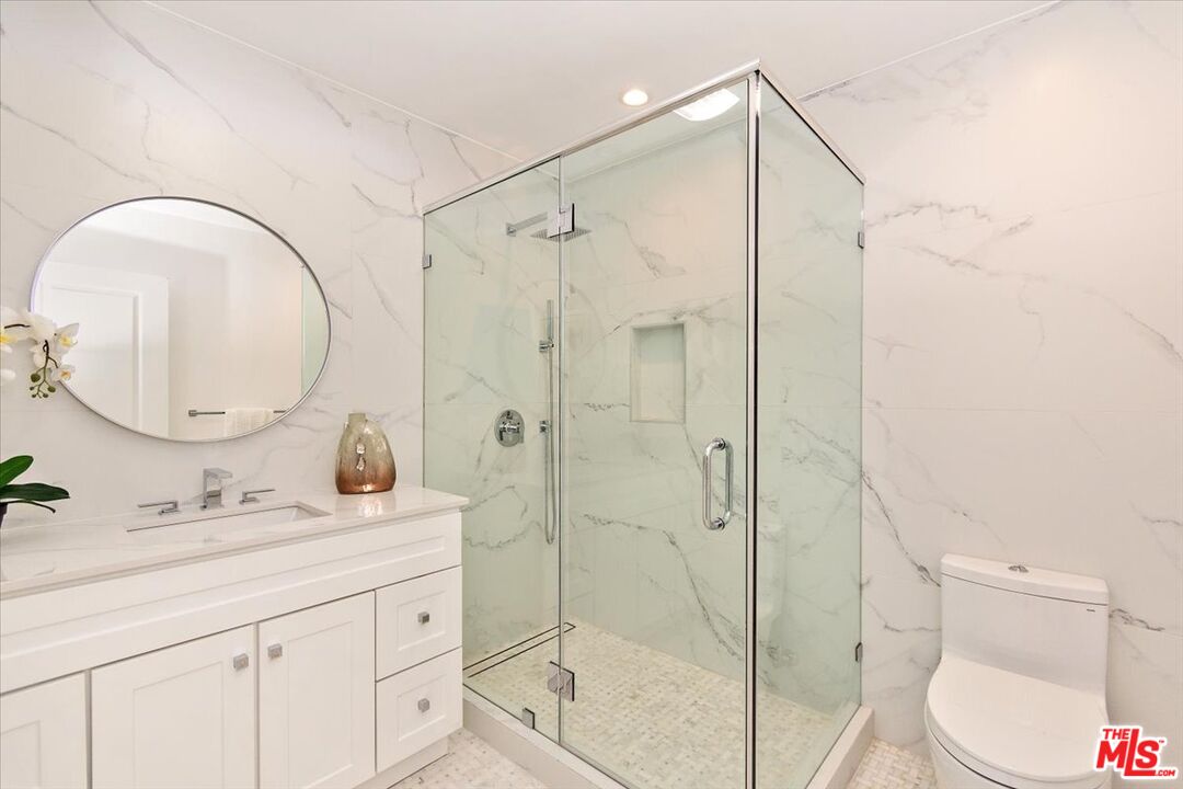 20 Ironsides Street, Unit 3 Marina del Rey, CA 90292 - Photo 11 of 32 a bathroom with a sink a toilet and a mirror