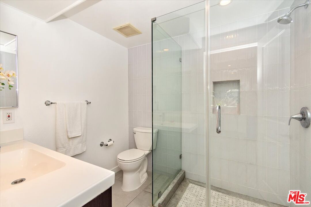 20 Ironsides Street, Unit 3 Marina del Rey, CA 90292 - Photo 21 of 32 a bathroom with a sink a toilet and shower