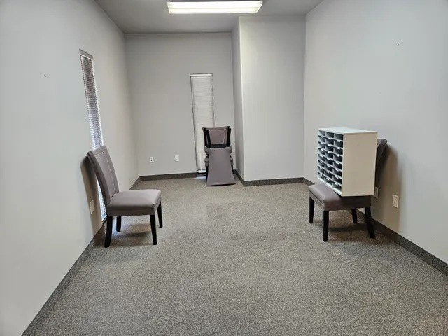 a room with furniture and window