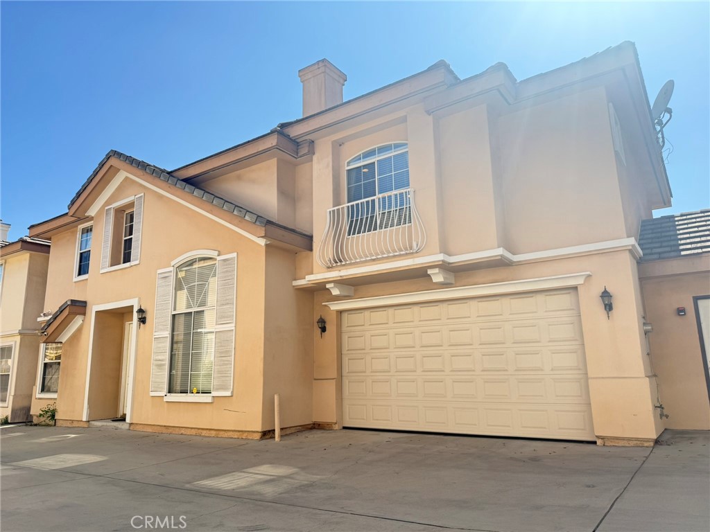 929 West Duarte Road, Unit B Arcadia, CA 91007 - Photo 2 of 11 a front view of a house with a garage