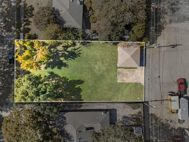 a house with swimming pool in front of it