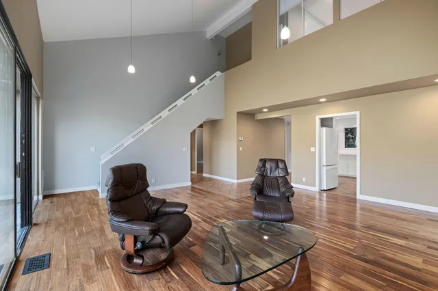 a view of a pathway with a wrought fence