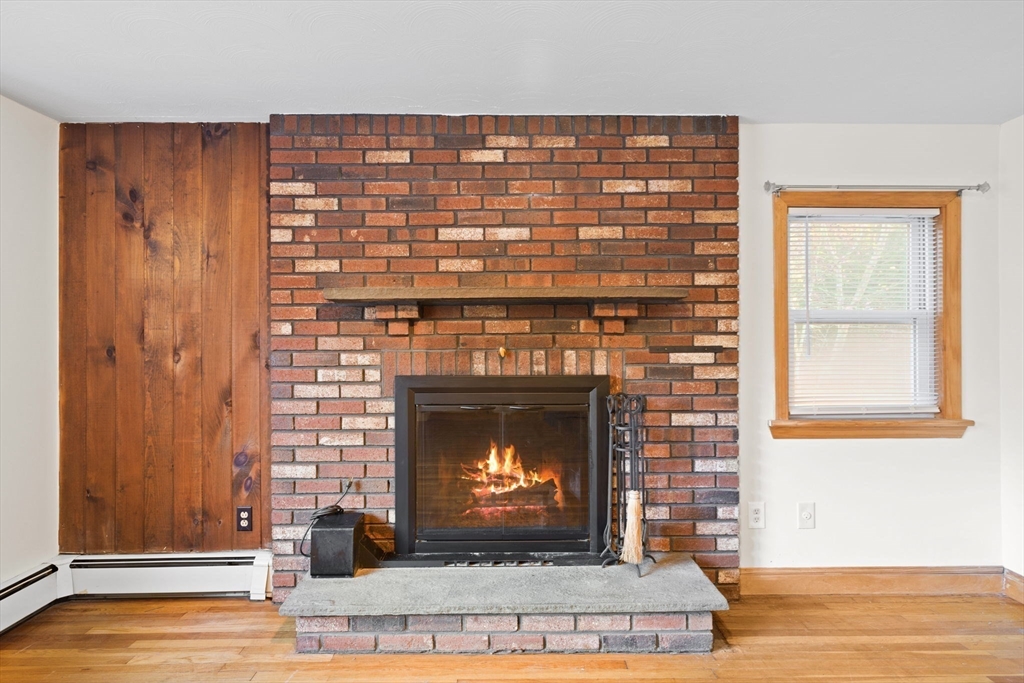 53 Forge Road Assonet, MA 02702 - Photo 7 of 39 a living room with fireplace